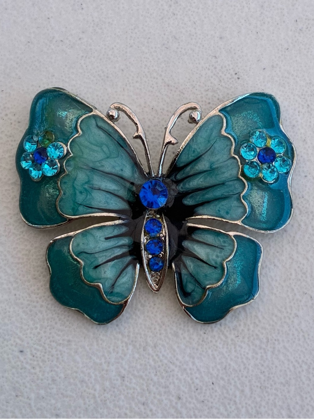 Elegant Teal Enamel Butterfly Brooch with Blue Rhinestone Accents